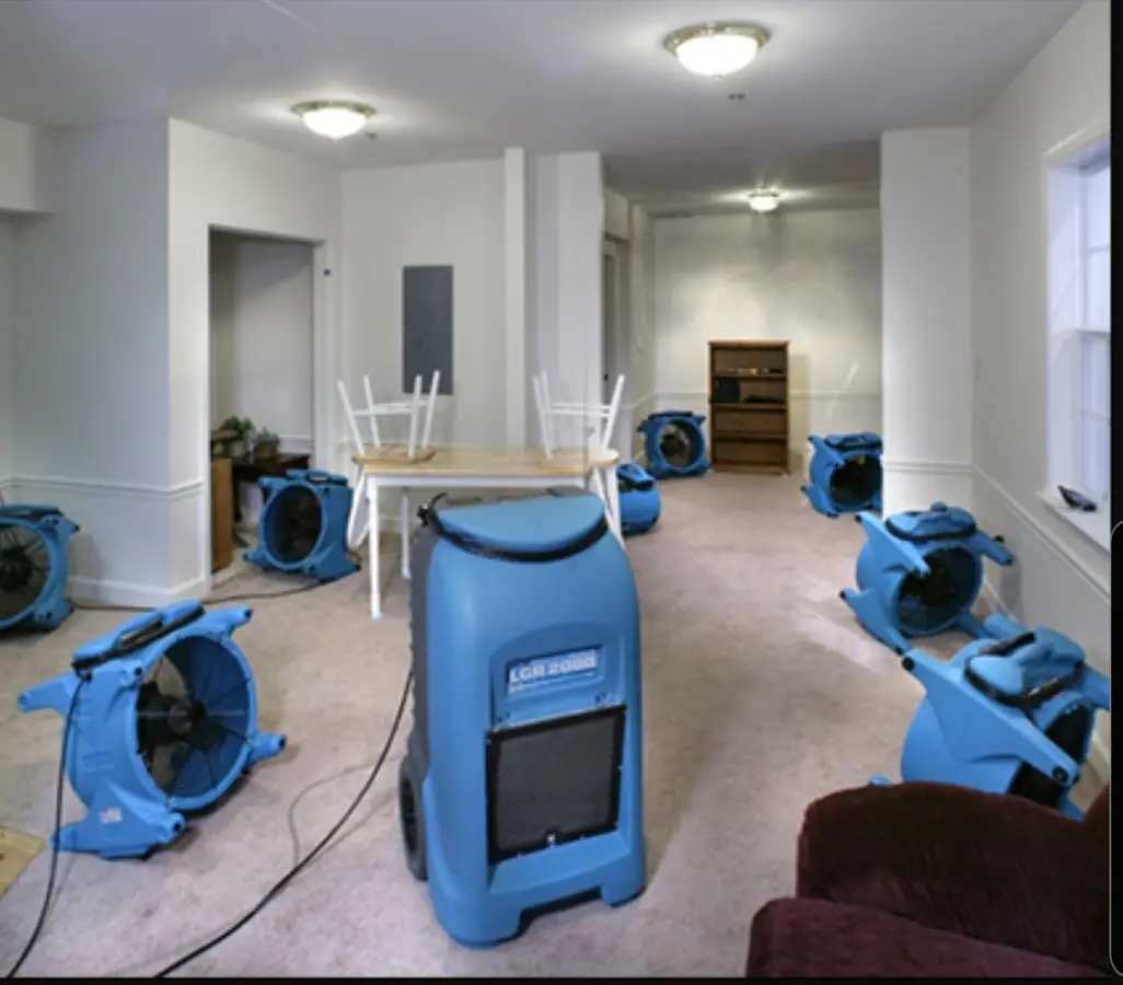 Air movers and dehumidifier setup for Water Damage Restoration in Slidell